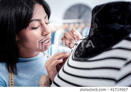 Skillful young woman creating the design Skillful young woman creating the design 45714907