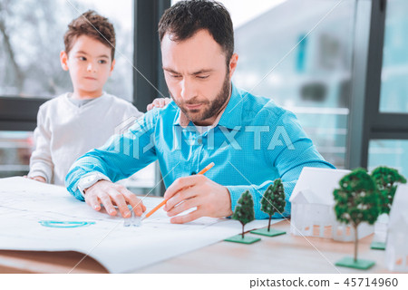 Attractive engineer working on the project 45714960