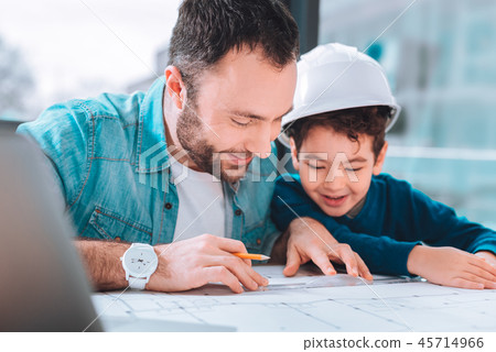 Successful man and his son thinking about the new project 45714966