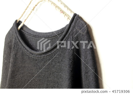 Black cut-out upper body hung on a hanger on white background Black cut-out upper body hung on a hanger on white background 45719306