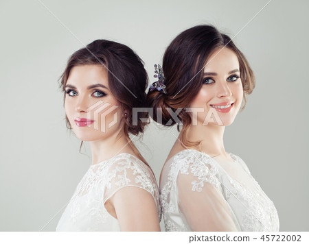 Two beautiful women bride with makeup Two beautiful women bride with makeup 45722002