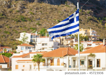 Greek flag against town Greek flag against town 45723936