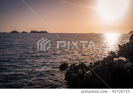 Sunset over the rocky Croatian coast Sunset over the rocky Croatian coast 45726735
