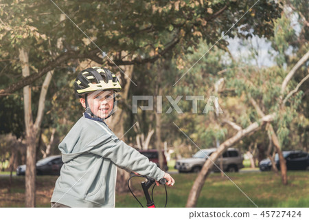 Australian boy riding bicycle 45727424