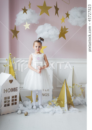 Little girl in fairy costume in fairy decoration Little girl in fairy costume in fairy decoration 45727823