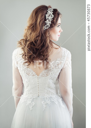 Charming young bride woman, back and profile 45730873