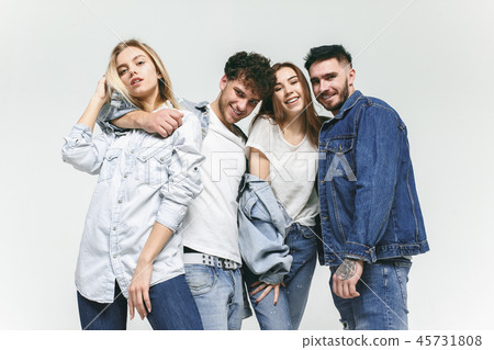 Group of smiling friends in fashionable jeans Group of smiling friends in fashionable jeans 45731808