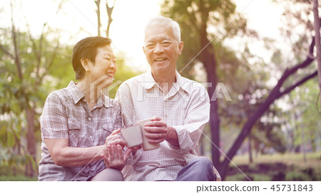 Healthy Asian senior couple coffee park together Healthy Asian senior couple coffee park together 45731843