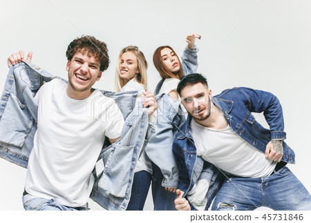 Group of smiling friends in fashionable jeans Group of smiling friends in fashionable jeans 45731846
