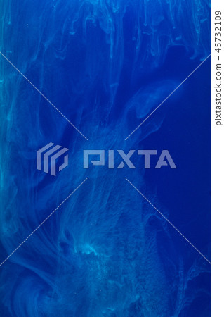 Abstract pattern falling into the water drop of blue ink - cyan ink dissolved in water Abstract pattern falling into the water drop of blue ink - cyan ink dissolved in water 45732109