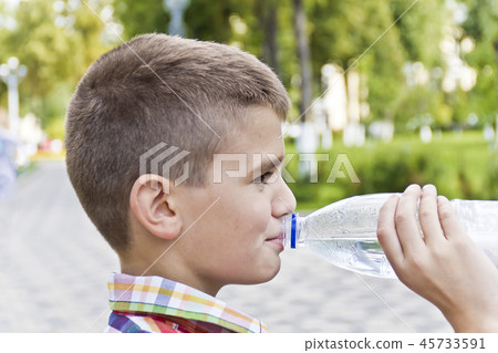 Cute brunette boy eleven years old 45733591