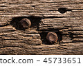 Grunge Faded Wooden Structure With Nut and Bolt. 45733651