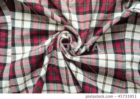 Wrinkled plaid material background Wrinkled plaid material background 45733951