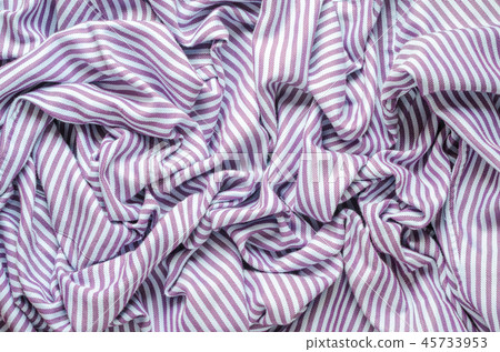 Crumpled striped fabric shirt background Crumpled striped fabric shirt background 45733953
