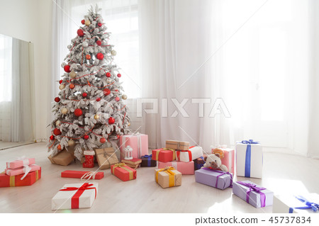 Christmas tree in the white room gifts new year Interior 45737834