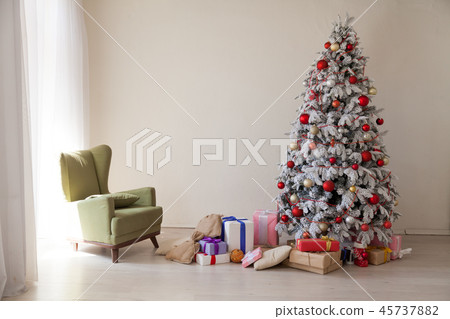 Christmas tree in the white room gifts new year Interior 45737882