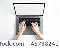 Lap top topview with hands on white background  45738241