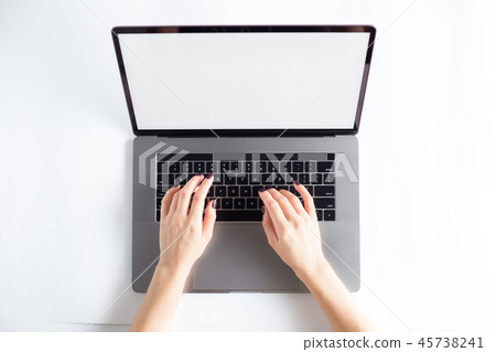 Lap top topview with hands on white background Lap top topview with hands on white background 45738241