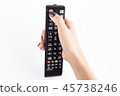Television controller in woman hand 45738246