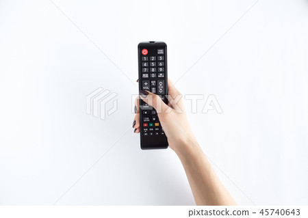 Television controller in woman hand Television controller in woman hand 45740643