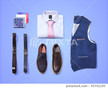 Classic clothes on blue blackboard. Classic clothes on blue blackboard. 45742295