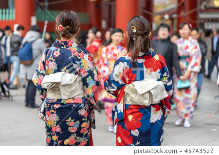 Young girl wearing Japanese kimono standing Young girl wearing Japanese kimono standing 45743522