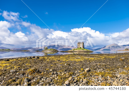 View of the Castle Stalker in autumn on the low tide near Port Appin, Argyll - Scotland View of the Castle Stalker in autumn on the low tide near Port Appin, Argyll - Scotland 45744180