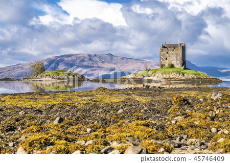 View of the Castle Stalker in autumn on the low tide near Port Appin, Argyll - Scotland View of the Castle Stalker in autumn on the low tide near Port Appin, Argyll - Scotland 45746409