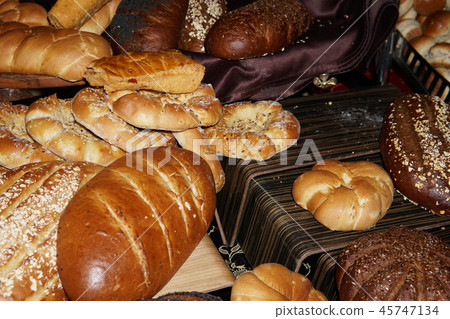 different bread rolls on the table bakeries 45747134