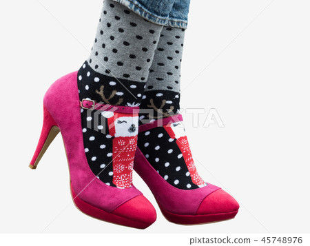 Female legs in stylish shoes, variegated socks Female legs in stylish shoes, variegated socks 45748976
