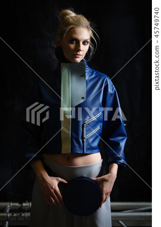 Girl in wide oversized leather jacket and skirt  45749740