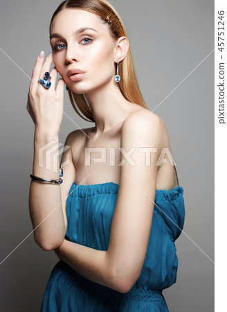 woman in blue dress. jewelry on beautiful girl 45751246