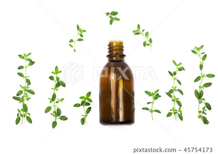Bottle of essential oil with herbs thyme isolated on white background Bottle of essential oil with herbs thyme isolated on white background 45754173
