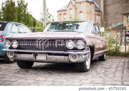 Close-up of headlights of luxurious vintage vehicle Close-up of headlights of luxurious vintage vehicle 45759193