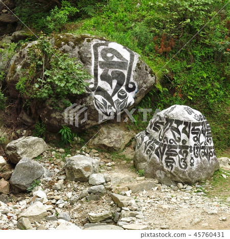 Buddhist mani stones near Lukla. Buddhist mani stones near Lukla. 45760431