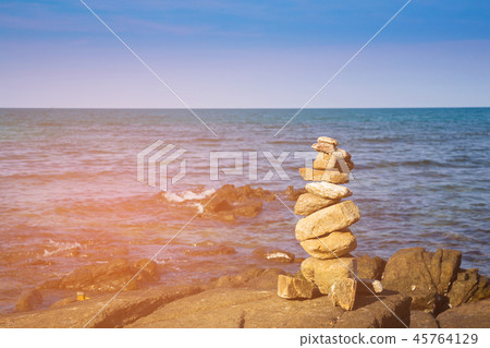 Stack stone on sea coast skyline Stack stone on sea coast skyline 45764129