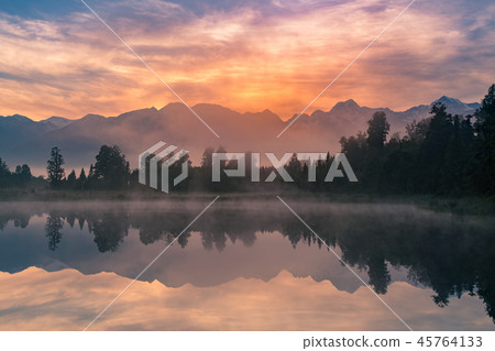 Sunrise over Matheson lake with Fox mountain Sunrise over Matheson lake with Fox mountain 45764133