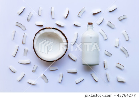 Coconut and coconut milk on white background. 45764277