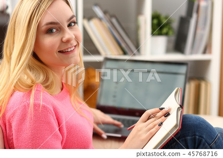 young beautiful woman read book study hard prepare for exam 45768716