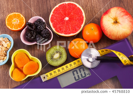 Electronic bathroom scale and healthy food 45768810