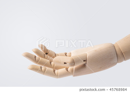 wooden hand with give posture isolated on white 45768984