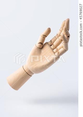 wooden raise hand with gesture isolated on white 45769027