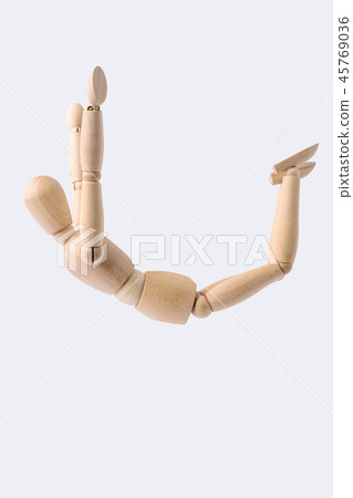 free falling wooden mannequin isolated on white 45769036