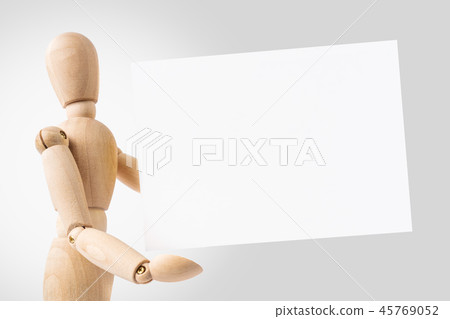 wooden mannequin hold empty board 45769052