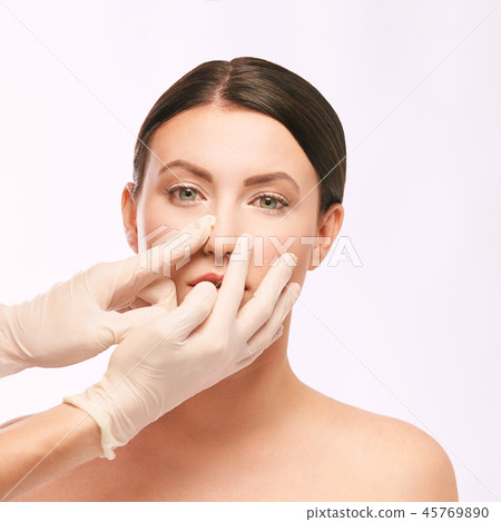 Plastic medical consultation. Doctor hands. Woman 45769890