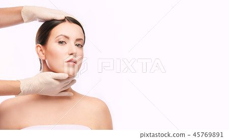 Girl medical diagnostics. Doctor hands Girl medical diagnostics. Doctor hands 45769891