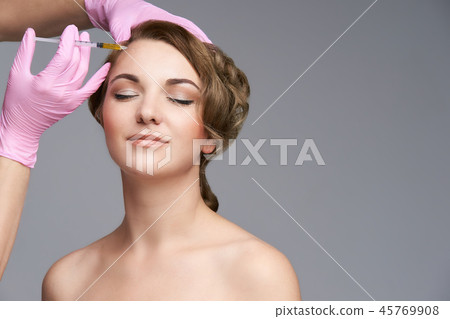 Young girl patient. Anti wrinkle filler injection. Young girl patient. Anti wrinkle filler injection. 45769908