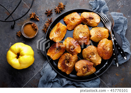 Apple quince baked with honey and cinnamon Apple quince baked with honey and cinnamon 45770101
