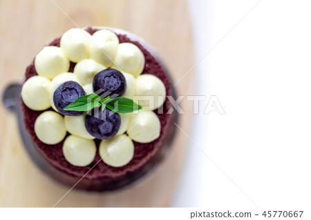 A cake with blueberries top view. A cake with blueberries top view. 45770667