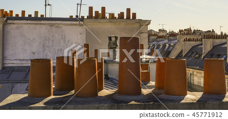 The roofs of Paris and its chimneys under a clouds sky The roofs of Paris and its chimneys under a clouds sky 45771912